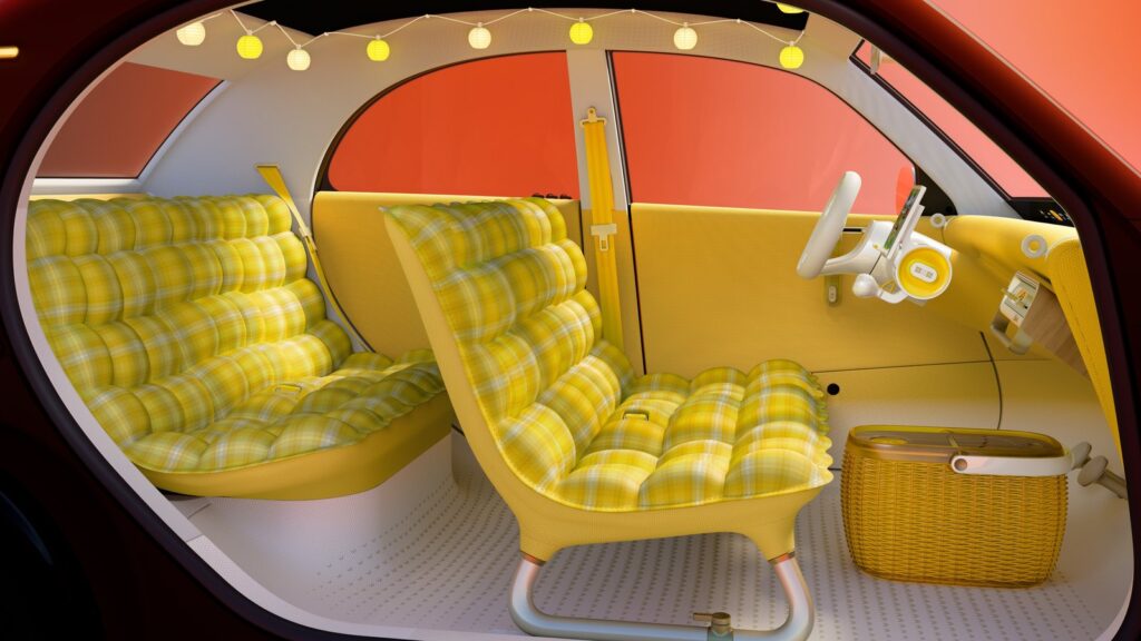 Habitacle de la Citroën 2 CV Concept avec banquettes en tartan jaune et panier de rangement